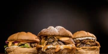 burger on brown wooden table