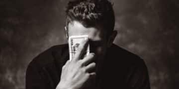 man holding banknote