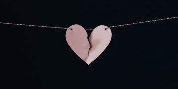 broken heart hanging on wire