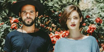 woman and man standing next each others